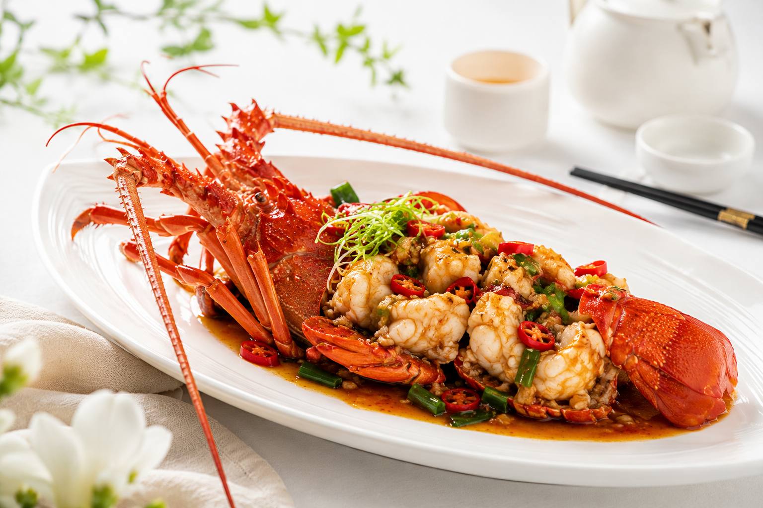 A whole wok tossed lobster with chilli and spring onion at The Marina
